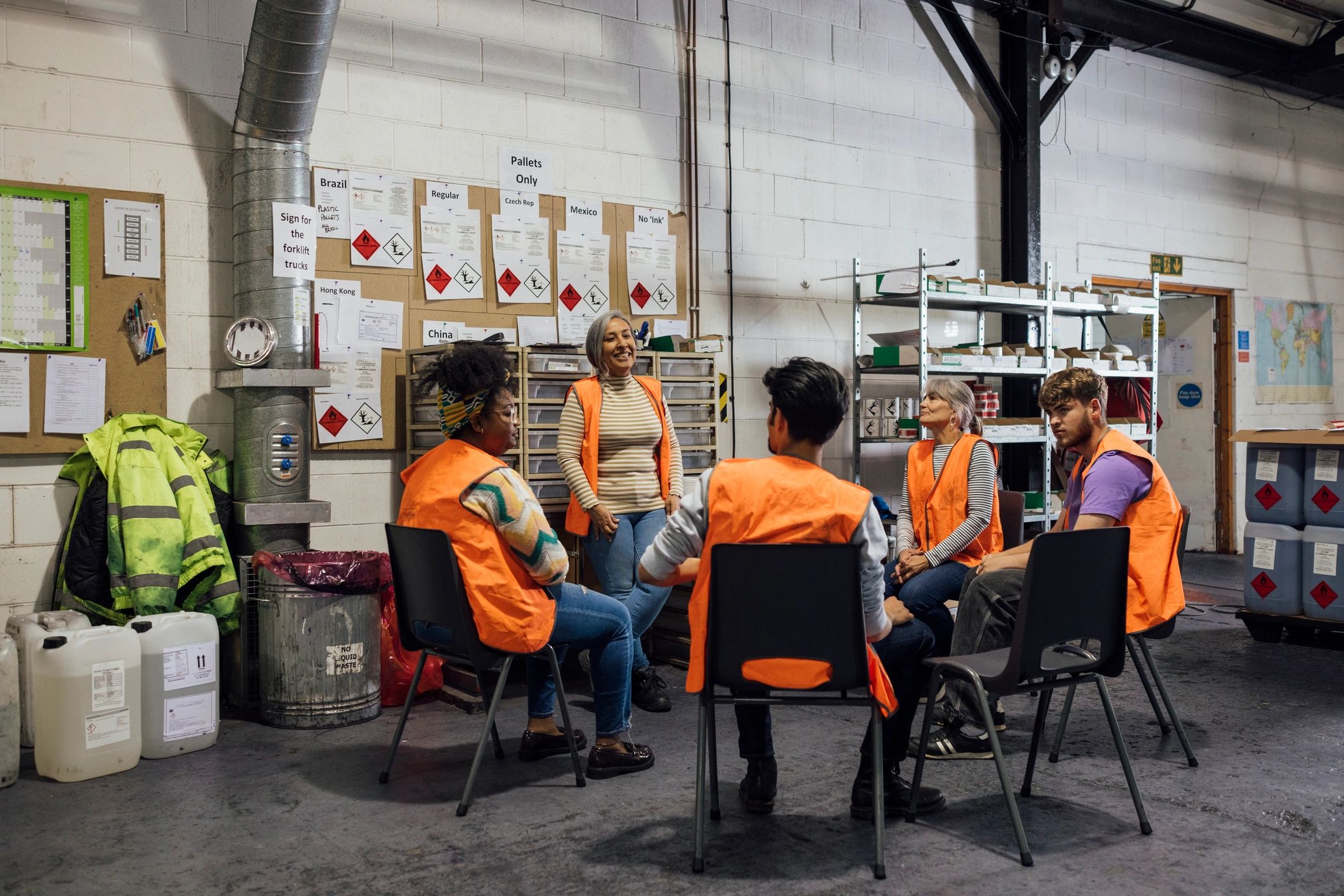 Workplace team gathered for safety training discussion