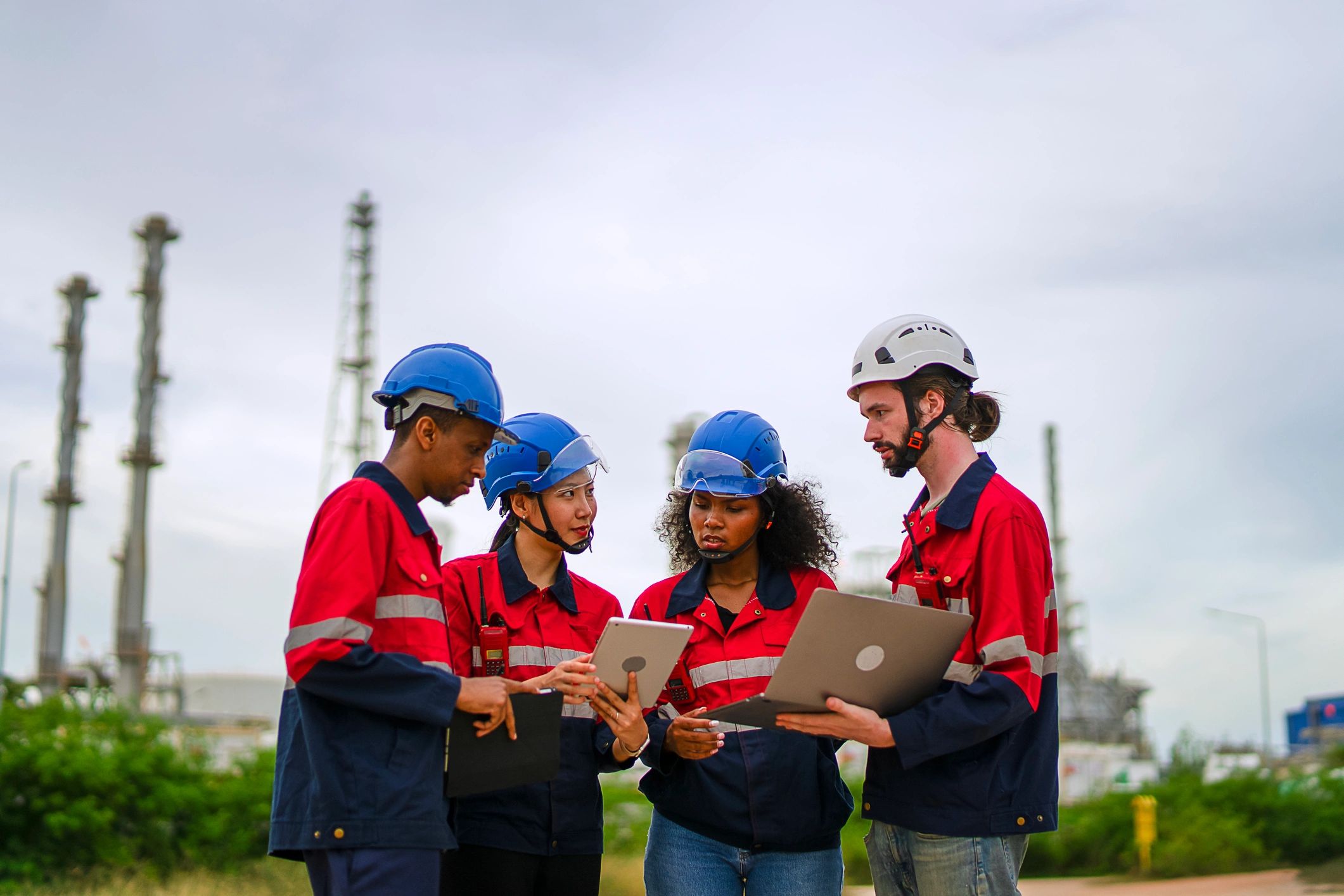 Industrial workers collaborating at a job site