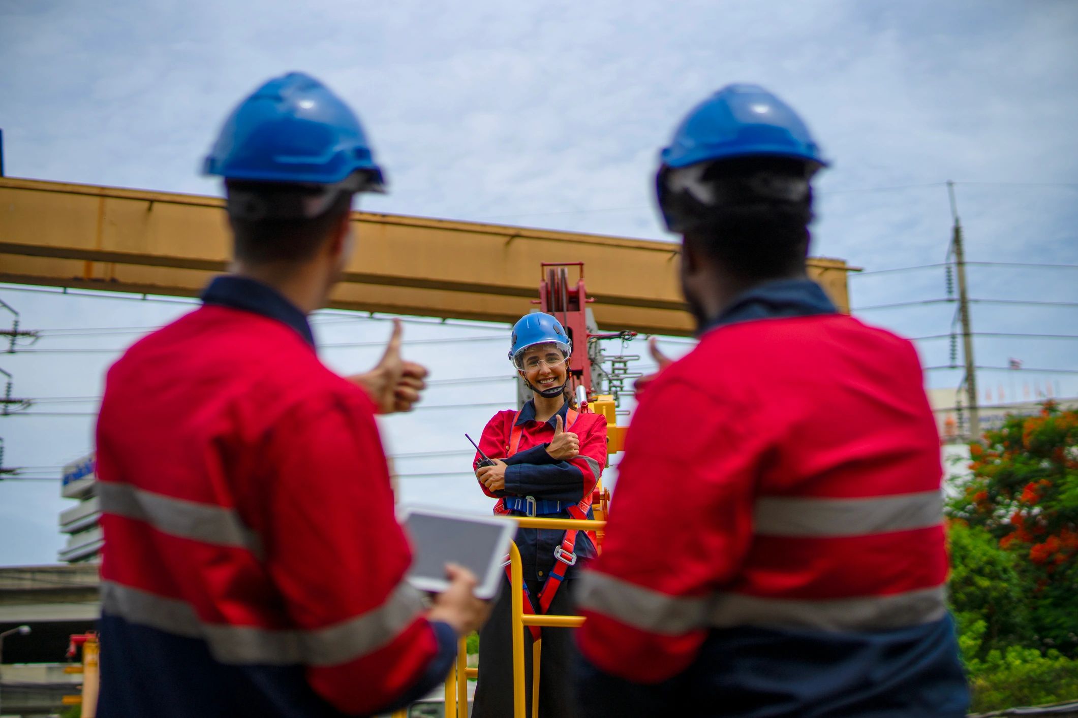 Engineers and workers collaborating at a construction site
